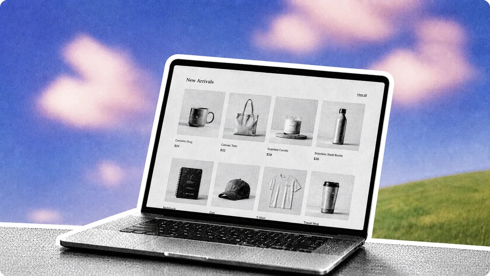 Un ordinateur portable affichant une grille de produits physiques comme des mugs, tote bags et vêtements